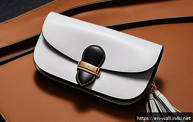 디올 새들 지갑과 미니 지갑 추천 - A close-up shot of a Dior Saddle wallet resting elegantly on a sleek black leather handbag, highligh...